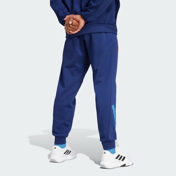 ADIDAS PERFORMANCE Tapered Sporthose 'France Travel Z.N.E.' in Blau