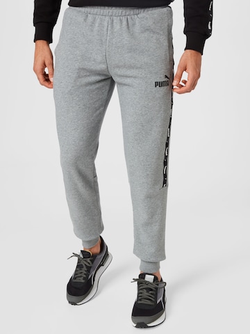 PUMA Regular Sports trousers in Grey: front