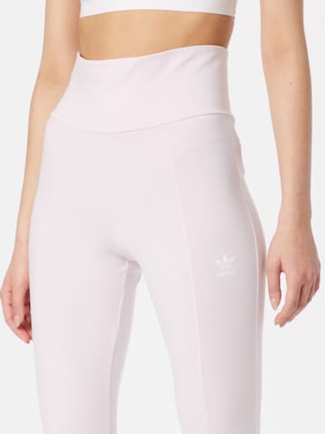 ADIDAS ORIGINALS Flared Leggings in Roze