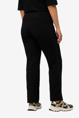 Ulla Popken Flared Workout Pants in Black: front