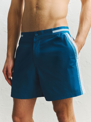 Shorts de bain Next en bleu : devant