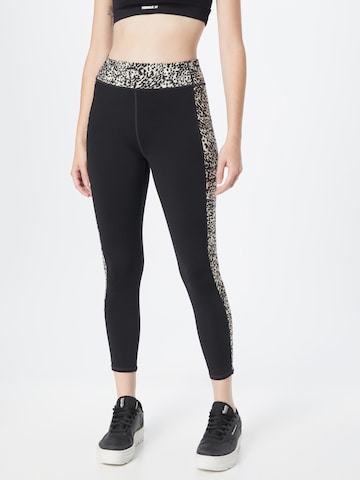 SKECHERS Skinny Workout Pants in Black: front