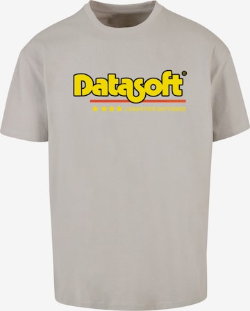 F4NT4STIC Shirt 'DATASOFT Logo yellow Retro Gaming SEVENSQUARED' in Grijs: voorkant