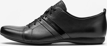 Scarpa stringata sportiva di Kazar in nero: frontale