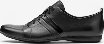 melns Kazar Sporta apavi ar šņorēm: no priekšpuses