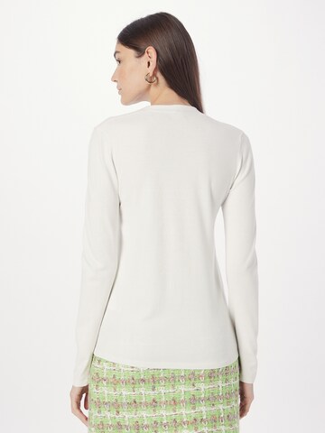 Pull-over Sisley en beige