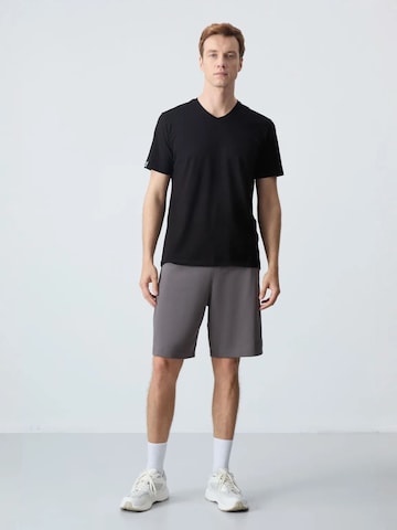 Wide leg Pantaloni di Tommy Life in grigio