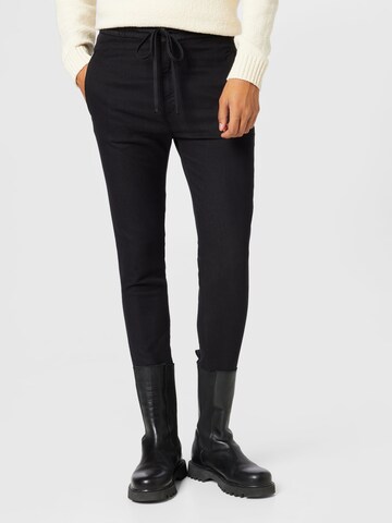 DRYKORN Tapered Pants 'JEGER' in Black: front