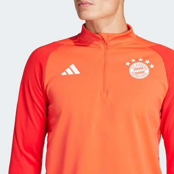 Tricou funcțional 'FC Bayern München Tiro 23' de la ADIDAS PERFORMANCE pe portocaliu