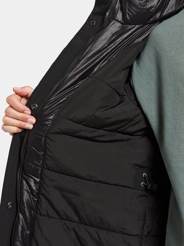 Didriksons Pitkä takki ulkoiluun 'LEYA' värissä musta