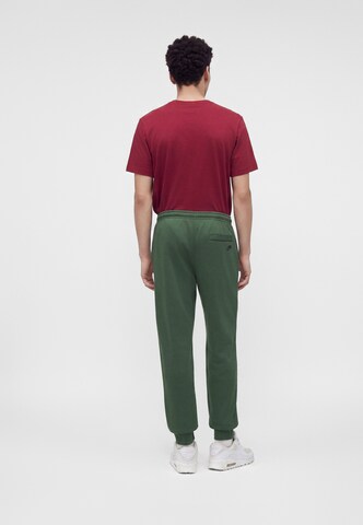 Nike Sportswear Tapered Hose 'CLUB' in Grün