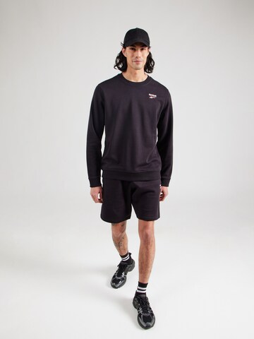 Hanorac sport de la Reebok pe negru