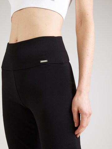 Aim'n Flared Sports trousers in Black