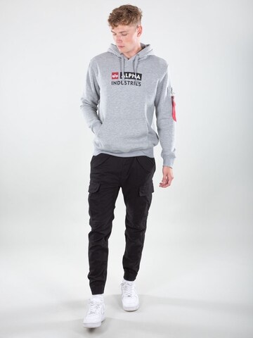 ALPHA INDUSTRIES Zúžený Kapsáče 'Airman' – černá
