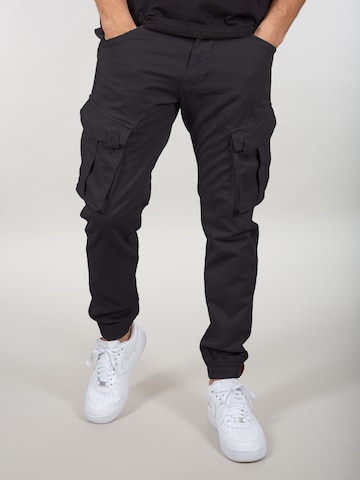 ALPHA INDUSTRIES Slimfit Cargobyxa 'Spy Pant' i svart