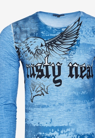 Rusty Neal Langarmshirt mit coolem Front- Print in Blau