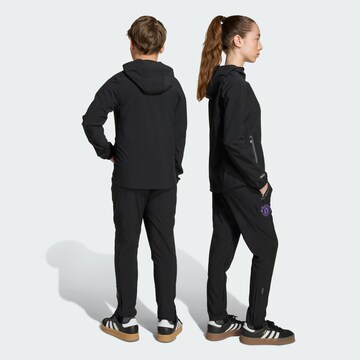 Regular Pantalon de sport 'Manchester United Tiro 25 Competition' ADIDAS PERFORMANCE en noir