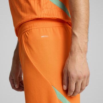 Regular Pantalon de sport PUMA en orange