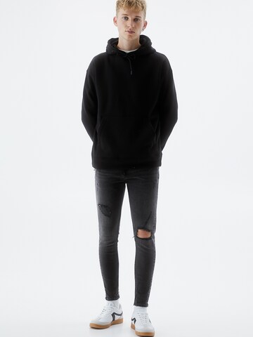 Pull&Bear Tapered Jeans i sort