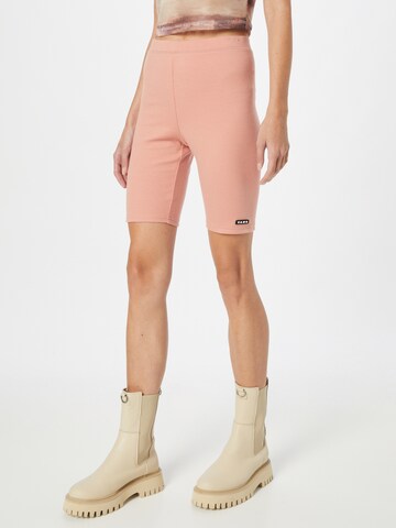 VANS Skinny Leggings 'WM WELL SUITED' in Pink: predná strana