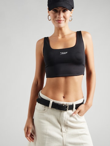 Top de la Tommy Jeans pe negru: față