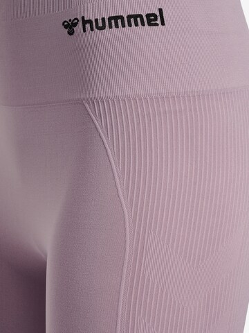 Hummel Skinny Spodnie sportowe 'TIF' w kolorze fioletowy
