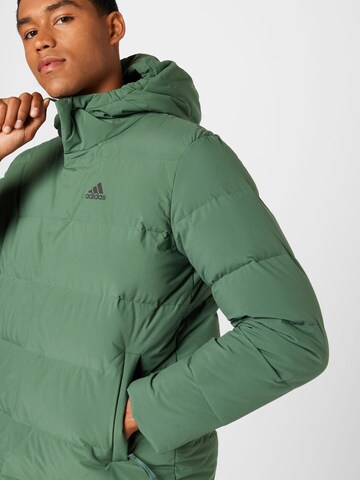 ADIDAS SPORTSWEAR Outdoor jacket 'Helionic Down' in Green