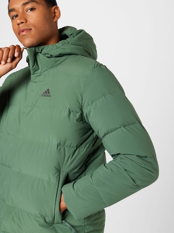 ADIDAS SPORTSWEAR Outdoorová bunda 'Helionic Down' – zelená