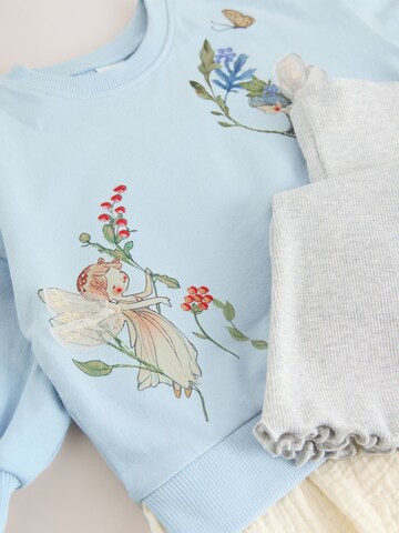 Set Next en bleu