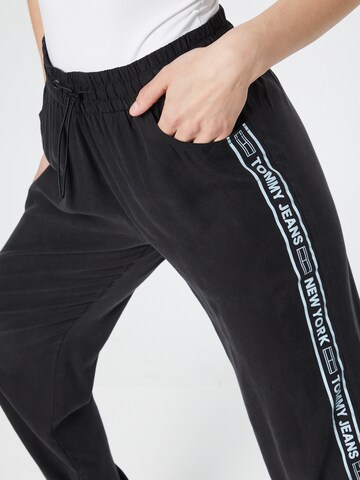 Tommy Jeans - Tapered Pantalón 'Relaxed' en negro