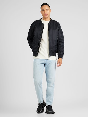 Tommy Jeans Regular Jeans 'Isaac' in Blauw