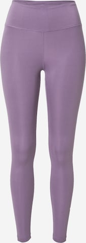 NIKE Sports trousers in Purple: front