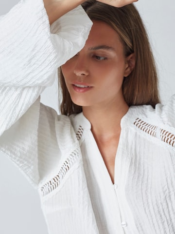 Chemisier 'Shina' co'couture en blanc