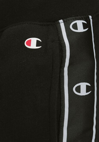 Effilé Pantalon de sport Champion Authentic Athletic Apparel en noir