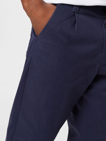 Tapered Pantaloni chino di Tommy Jeans in blu