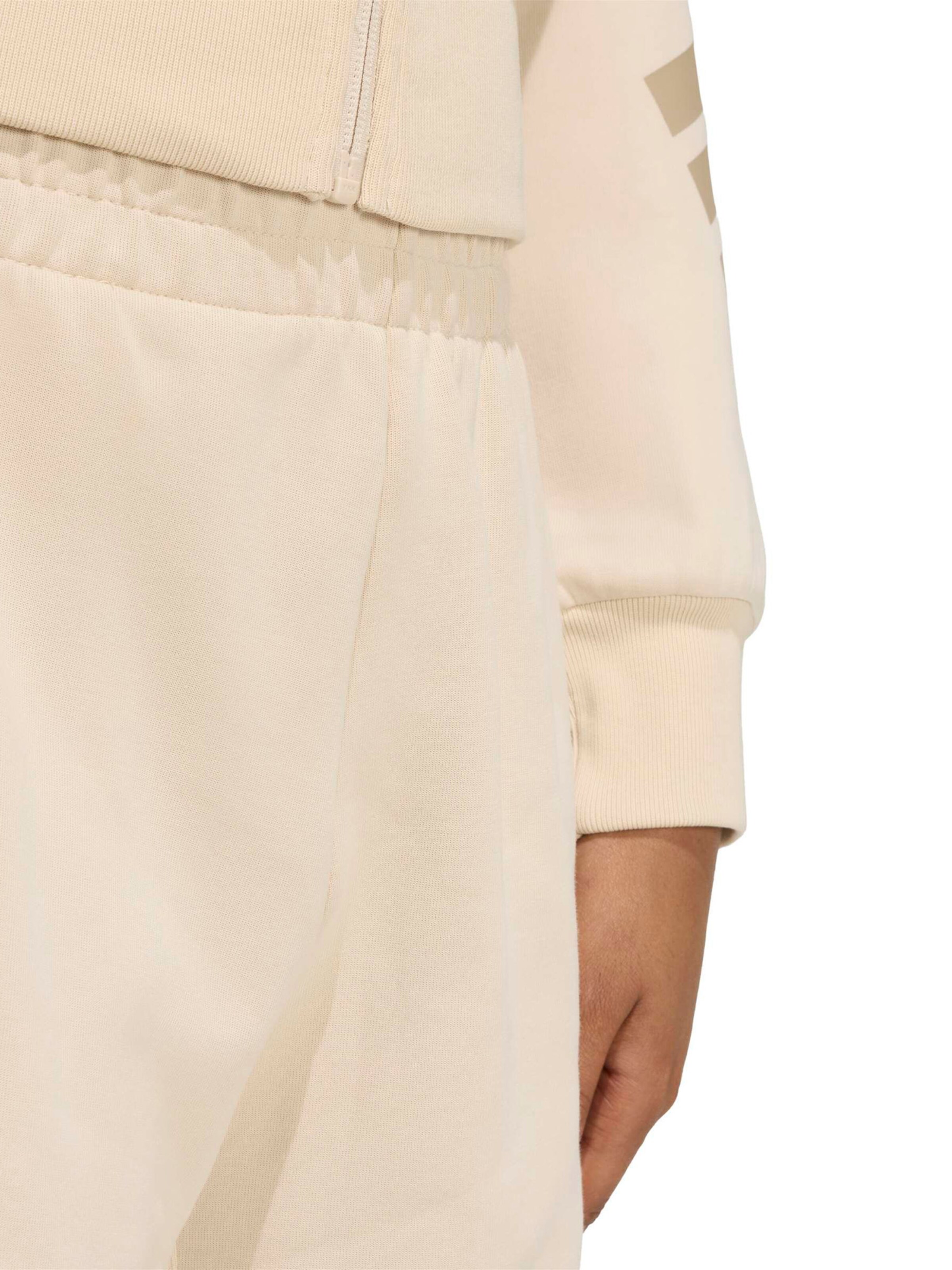 ADIDAS SPORTSWEAR Loose fit Sports trousers 'Future Icons' in Beige