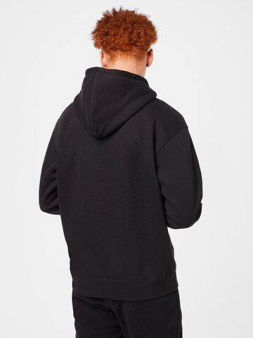 Sweat-shirt Obey en noir
