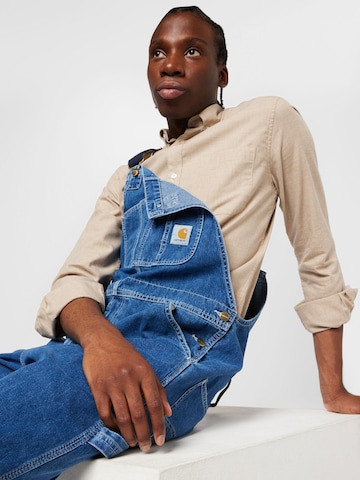 Loosefit Jeans con pettorina di Carhartt WIP in blu