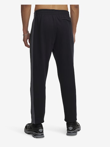 UNDER ARMOUR Tapered Sports trousers 'Rival' in Black