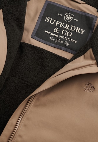 Superdry & Co Tussenjas 'City' in Bruin