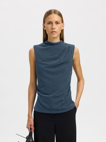 SELECTED Overdel i blå: forside