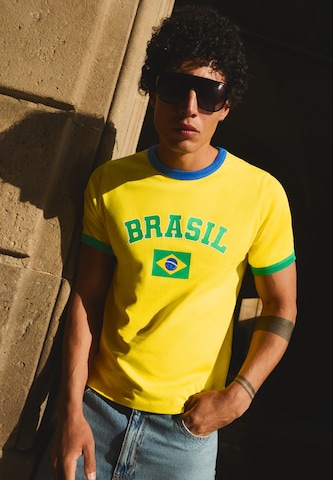 Tricou 'MUNDIAL' de la Bershka pe galben: față