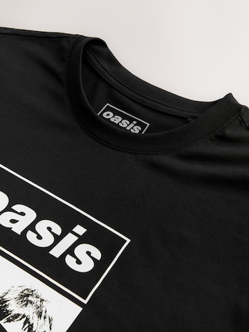 Next Paita 'Oasis' värissä musta