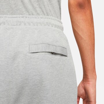 Nike Sportswear Tapered Pants 'Swoosh Tech' in Grey