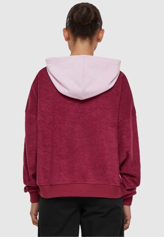 Karl Kani Sweatshirt in Roze