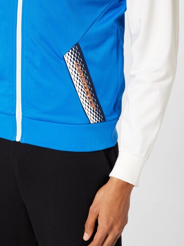 Lacoste Sport - Chaqueta de chándal en azul
