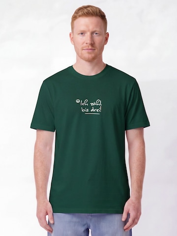 Maglietta 'Ich Zähl Bis Drei' di Watapparel in verde: frontale