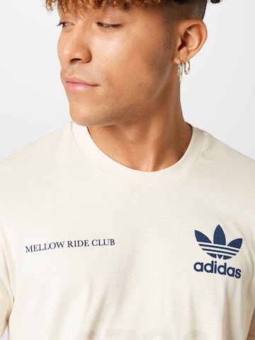 ADIDAS ORIGINALS T-Shirt 'Graphics Mellow Ride Club' in Beige