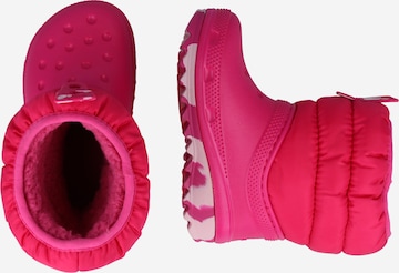 Bottes de neige Crocs en rose