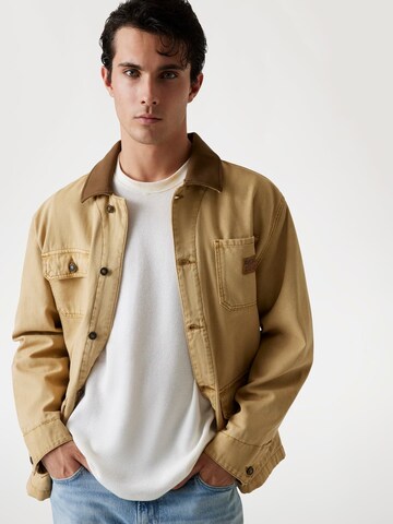GUESS Between-Season Jacket in Brown
